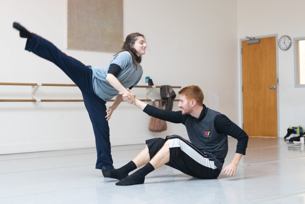 David Calhoun holds Anna Gichan in counterbalance, as Anna extends an arabesque